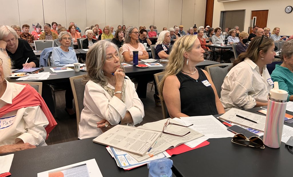 The audience of 100 people included members from both branches and community members